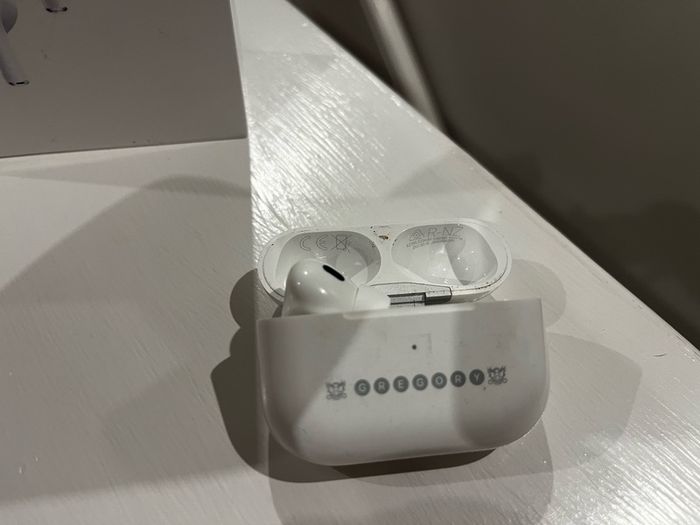 AirPods Pro 2 left earbud and case