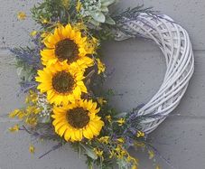 55cm white wicker heart wreath with sunflowers