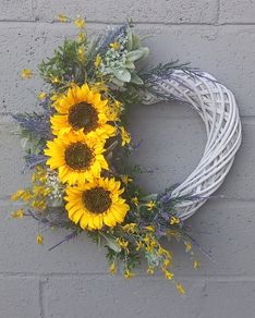 55cm white wicker heart wreath with sunflowers