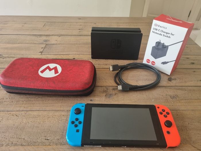 Nintendo Switch Standard Bundle + Case & 7 Games (Mario, Minecraft)