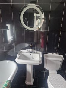 bathroom sink and mirror