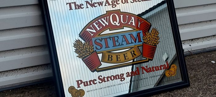 The New age of steam beer mirror ,,newquay,lovely advertising display beer mirror,,nice in any home bar or man cave pub restaurant etc, buyer collects, see pictures for condition, sold as seen.