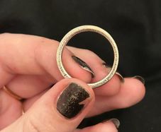 Silver ring with small stone