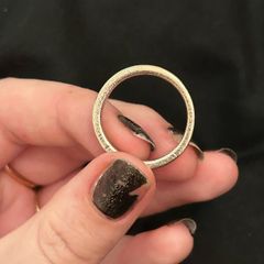 Silver ring with small stone