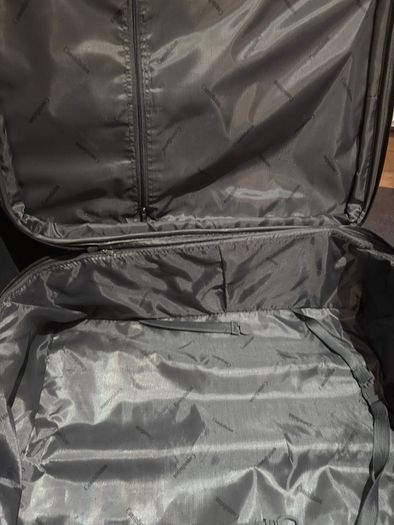 Black suitcase with brown trim