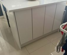 kitchen island and two stools