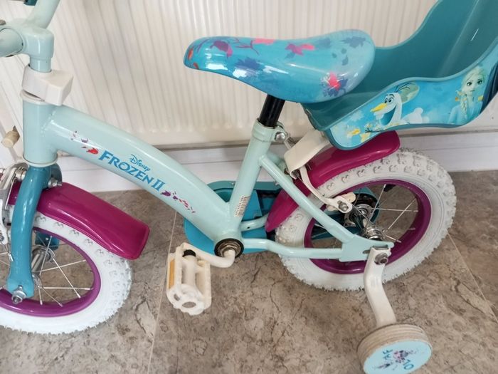 Kids frozen bike size 12 inch wheels.