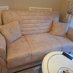 3 seater and matching 2 seater storage compartment underneath and can also be used as pull out bed