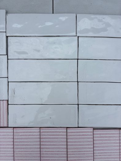 Pink ceramic and white tiles