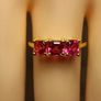 Stunning Lab Grown Padparasha Sapphire Trilogy Ring. Image 4