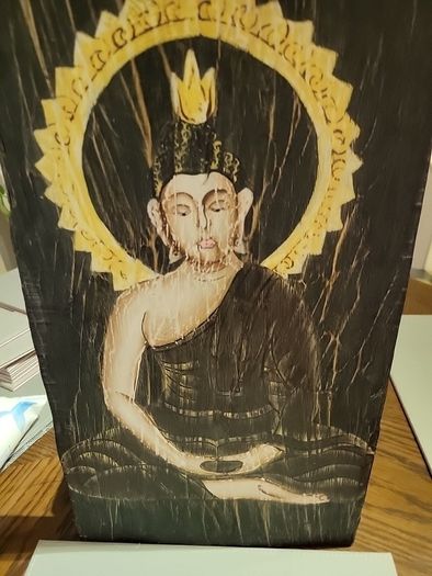 Buddha on wood