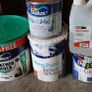 a selection of paint and a paint roller and some good paint brushes Image 6
