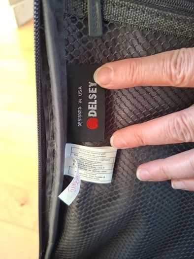 Delsey wheelie suitcase.