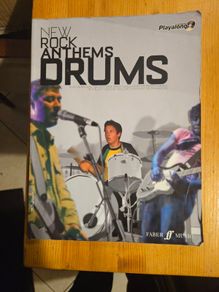 New Rock Anthems Drums. Complete With Cd. Large Volume Paperback In Good Condition.  See Photos For Same.