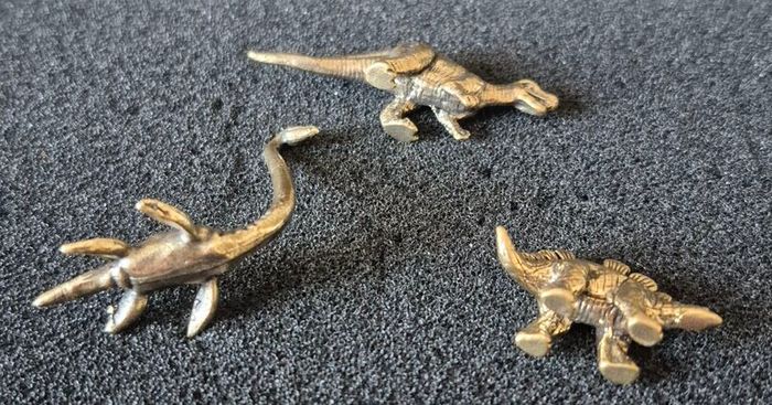 3 brass Dinosaurs, Solid brass.