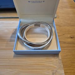 Newbridge Silver crossed double bangle.