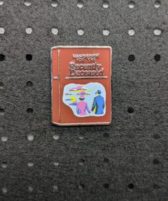 Book of the rwcently deceased enamel pin