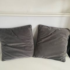 2 gray cushions