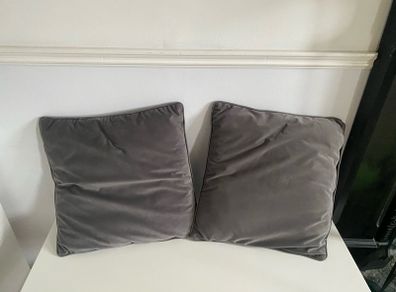 2 gray cushions