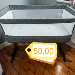 babylo beside cot