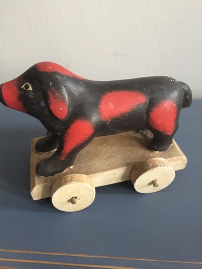 vintage wooden dog on wheels