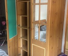 Selling 2 door wardrobe with shelves and hanging space