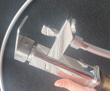 Bath tap with a shower head