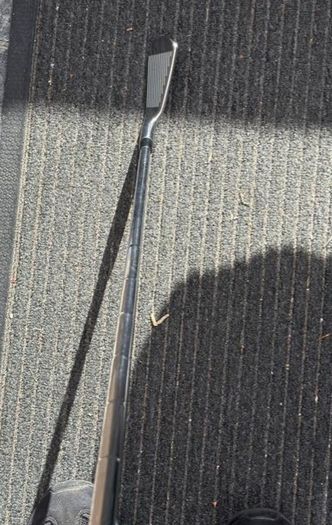 Titleist T100s irons.