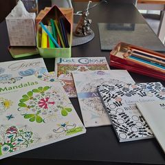 colouring books and markers and pencils