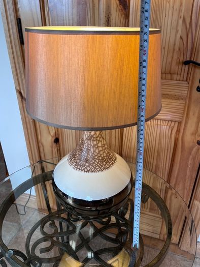 Ceramic lamp 65 euro. Brass with glass shade 95 euro . Chinese style 50 euro .