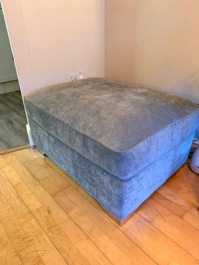 Grey corner couch incl. matching pouffe