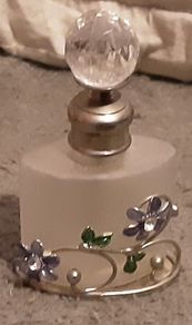 Nice glass and white metal perfume bottle
