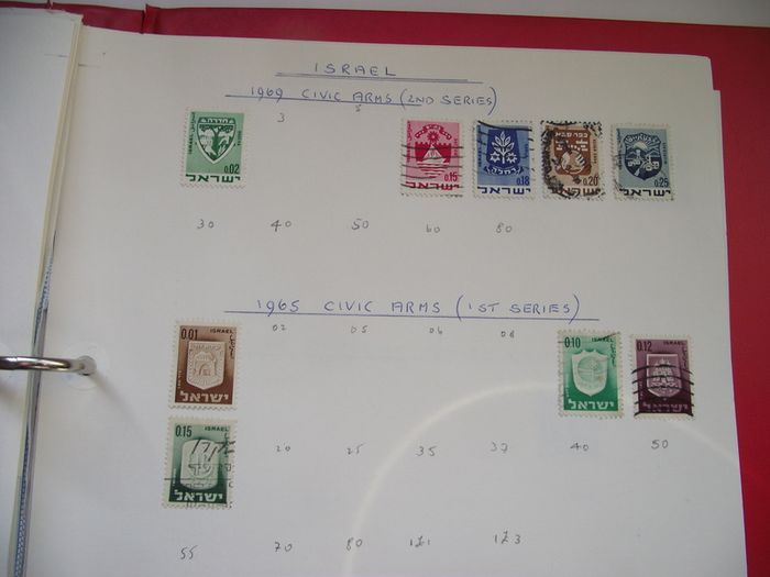 A collection of stamps from Isle of Man and Israel on albums pages (1950-1998) in the binder