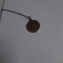 Gold disc and chain Image 5
