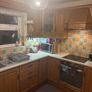 Wooden kitchen cabinets with dish washer and oven Image 6