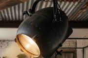 Large old studio light with variable distance from lens.