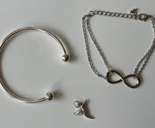 Brand New Bracelets and Charm Set