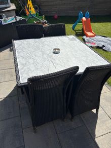 Table and 4 chairs in need of work free