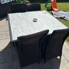 Table and 4 chairs in need of work free