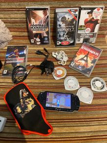 PSP  Console plus 10 games, charger and headphones