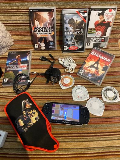 PSP  Console plus 10 games, charger and headphones