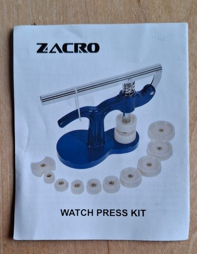 Watch back press
