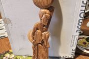 Vintage wall hanging wood carved  of Trip person carry water pot.