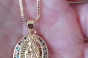 chain and our lady of Guadalupe pendant