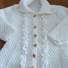 Brand new hand knitted baby cardigans and hooded jackets
