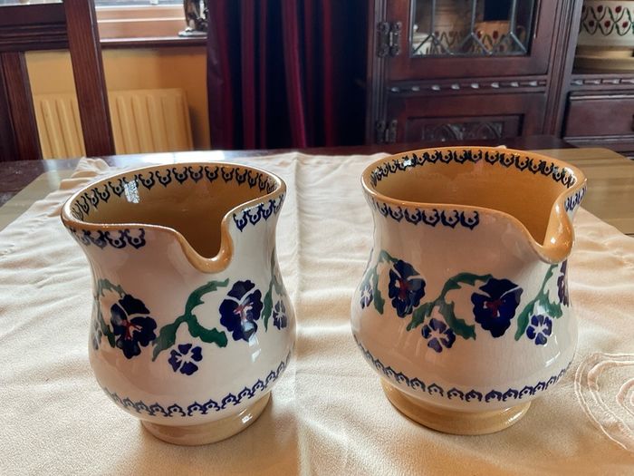 Nicholas Mosse two pansy jugs .  Both 4 inches  in height