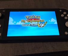 Nintendo switch lite + 64gb SD card + Pokemon mystery dungeon