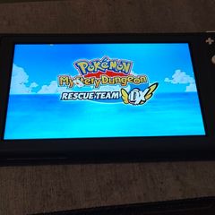 Nintendo switch lite + 64gb SD card + Pokemon mystery dungeon