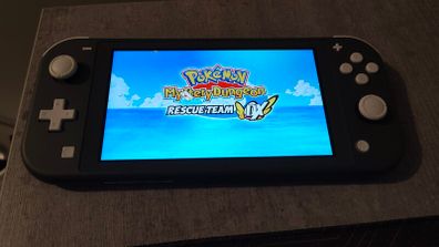Nintendo switch lite + 64gb SD card + Pokemon mystery dungeon