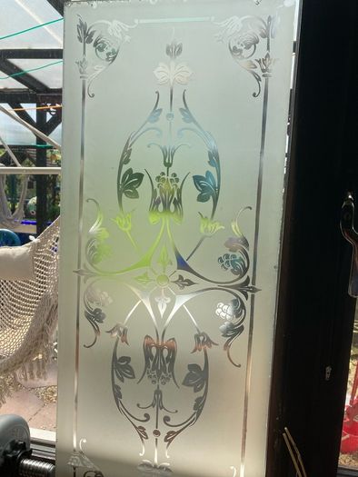 Acid etched glass panel